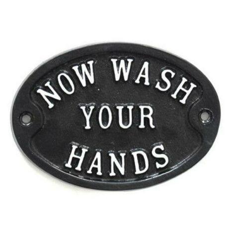 Skylt "Now wash.."