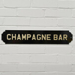 Skylt "Champagne Bar"
